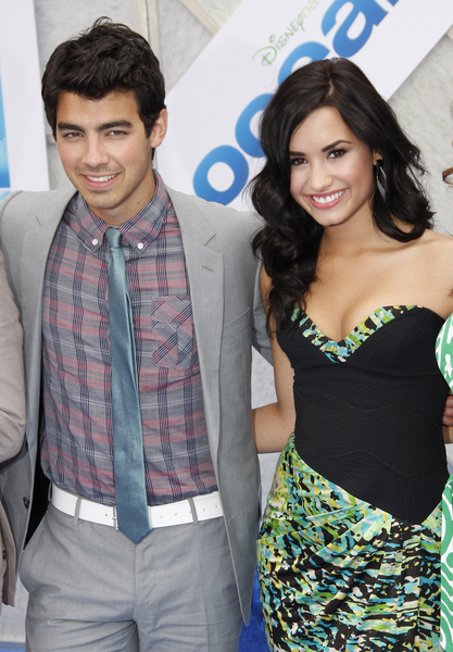 Joe Jonas and Demi Lovato Pictures Oceans Movie Premiere Red Carpet Photos